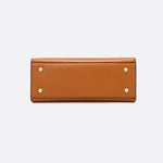 Aurora Signature Trapeze Bag – Structured Handbag with Turn - Lock Closure - in Camel | Arvea Bags