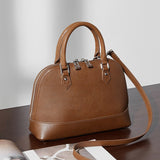 Calypso | Elegant Brown Dome Handbag – Classic Style & Everyday Luxury - in Maroon | Arvea Bags
