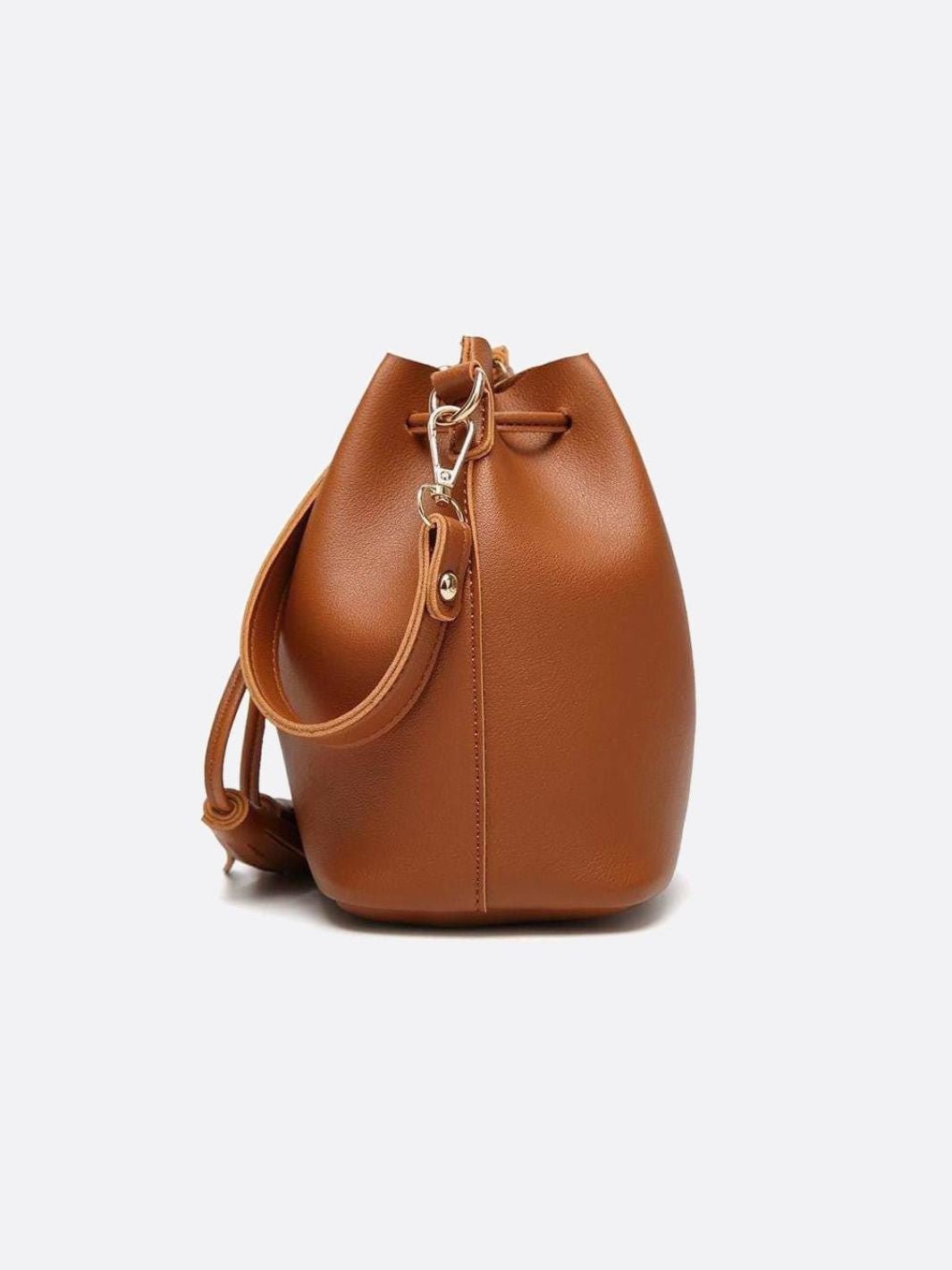 Camel Leather Bucket Bag with Tassels – Chic, Compact & Versatile - in Classic Brown | Arvea Bags