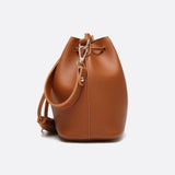 Camel Leather Bucket Bag with Tassels – Chic, Compact & Versatile - in Classic Brown | Arvea Bags
