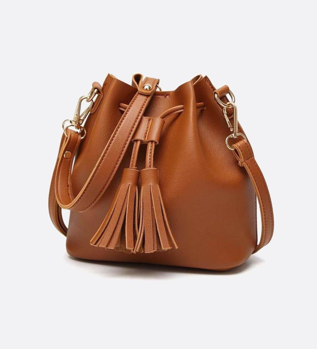 Camel Leather Bucket Bag with Tassels – Chic, Compact & Versatile - in Classic Brown | Arvea Bags