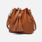 Camel Leather Bucket Bag with Tassels – Chic, Compact & Versatile - in Classic Brown | Arvea Bags