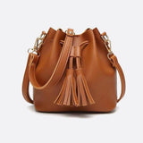 Camel Leather Bucket Bag with Tassels – Chic, Compact & Versatile - in Classic Brown | Arvea Bags