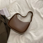 Curved Camel Leather Shoulder Bag for Women – Minimalist Everyday Style - in Caramel | Arvea Bags