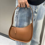 Curved Camel Leather Shoulder Bag for Women – Minimalist Everyday Style - in Caramel | Arvea Bags