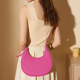 Dahlia Crescent Shoulder Bag – Sleek Black Minimalist Design - in Salmon Pink | Arvea Bags