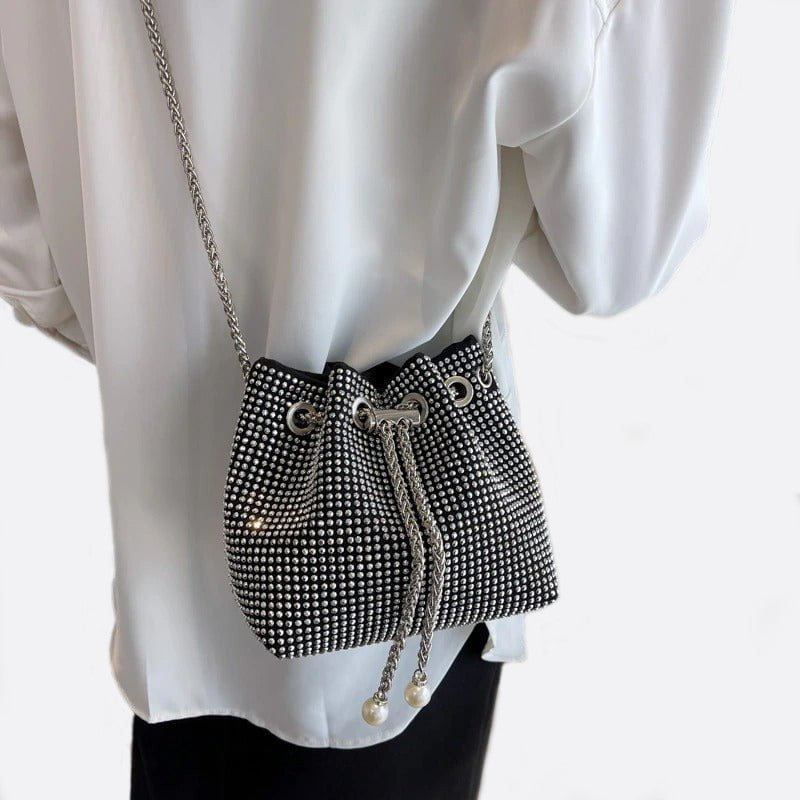 Drawstring bucket bag with rhinestones and chain strap - in Silver | Arvea Bags