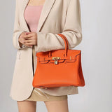 Elegant Designer Satchel Bag – Genuine Leather Handbag with Scarf - Wrapped Handle & Gold Hardware - in Orange | Arvea Bags