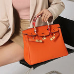 Elegant Designer Satchel Bag – Genuine Leather Handbag with Scarf - Wrapped Handle & Gold Hardware - in Orange | Arvea Bags