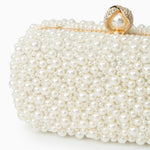 Elegant Pearl Clutch Bag – Designer - Inspired Evening Handbag with Gem Clasp & Gold Chain Description: - in Pearl White | Arvea Bags