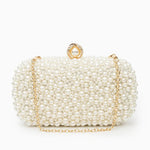 Elegant Pearl Clutch Bag – Designer - Inspired Evening Handbag with Gem Clasp & Gold Chain Description: - in Pearl White | Arvea Bags
