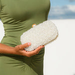 Elegant Pearl Clutch Bag – Designer - Inspired Evening Handbag with Gem Clasp & Gold Chain Description: - in Pearl White | Arvea Bags