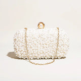 Elegant Pearl Clutch Bag – Designer - Inspired Evening Handbag with Gem Clasp & Gold Chain Description: - in Pearl White | Arvea Bags