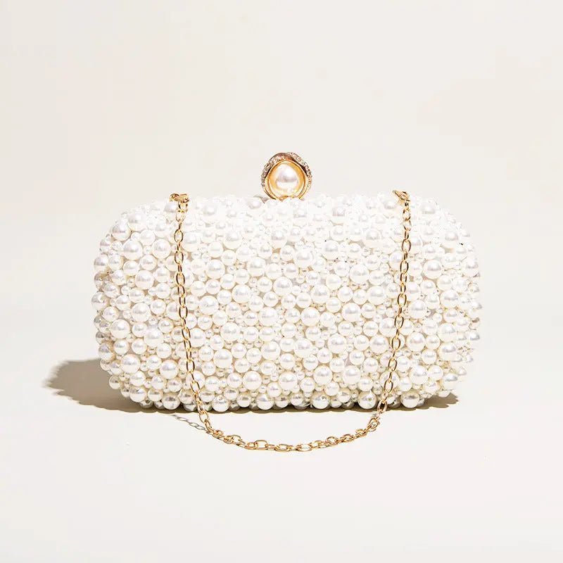 Elegant Pearl Clutch Bag – Designer - Inspired Evening Handbag with Gem Clasp & Gold Chain Description: - in Pearl White | Arvea Bags