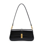 Éloise | Sleek Leather Baguette Bag – Detachable Strap & Gold - Tone Lock - in Black | Arvea Bags