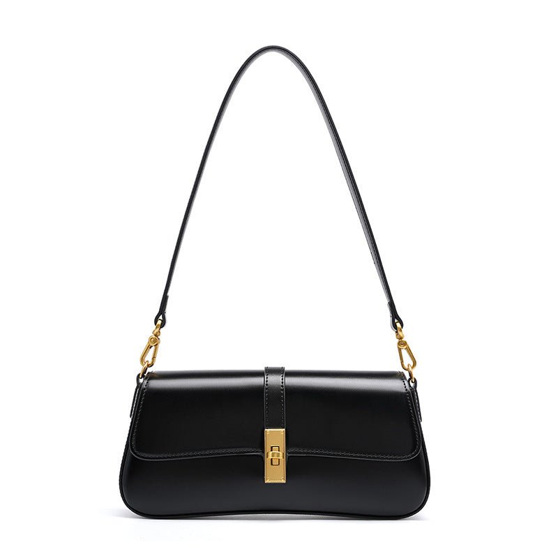 Éloise | Sleek Leather Baguette Bag – Detachable Strap & Gold - Tone Lock - in Black | Arvea Bags