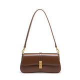 Éloise | Sleek Leather Baguette Bag – Detachable Strap & Gold - Tone Lock - in Brown | Arvea Bags