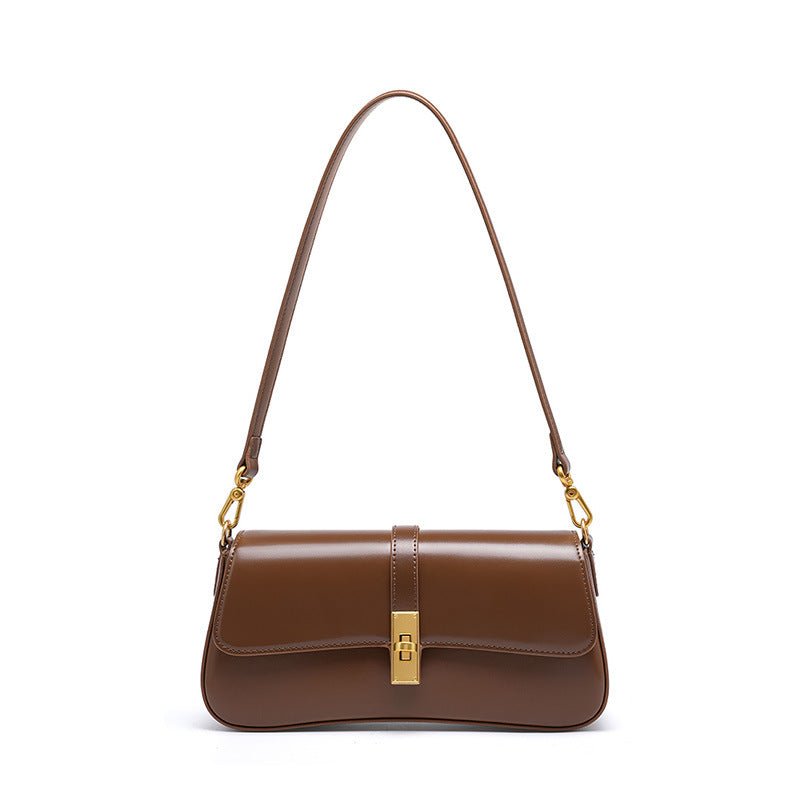Éloise | Sleek Leather Baguette Bag – Detachable Strap & Gold - Tone Lock - in Brown | Arvea Bags