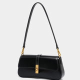 Éloise | Sleek Leather Baguette Bag – Detachable Strap & Gold - Tone Lock - in Brown | Arvea Bags