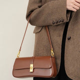 Éloise | Sleek Leather Baguette Bag – Detachable Strap & Gold - Tone Lock - in Burgundy | Arvea Bags