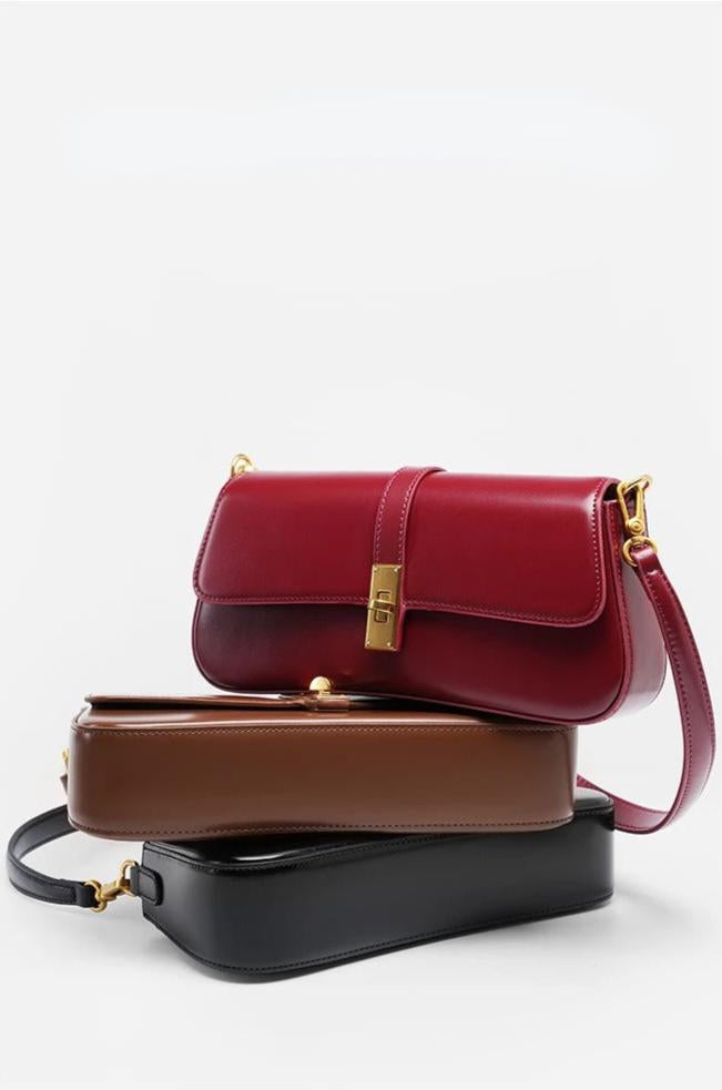 Éloise | Sleek Leather Baguette Bag – Detachable Strap & Gold - Tone Lock - in Burgundy | Arvea Bags
