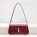 Éloise | Sleek Leather Baguette Bag – Detachable Strap & Gold - Tone Lock - in Burgundy | Arvea Bags