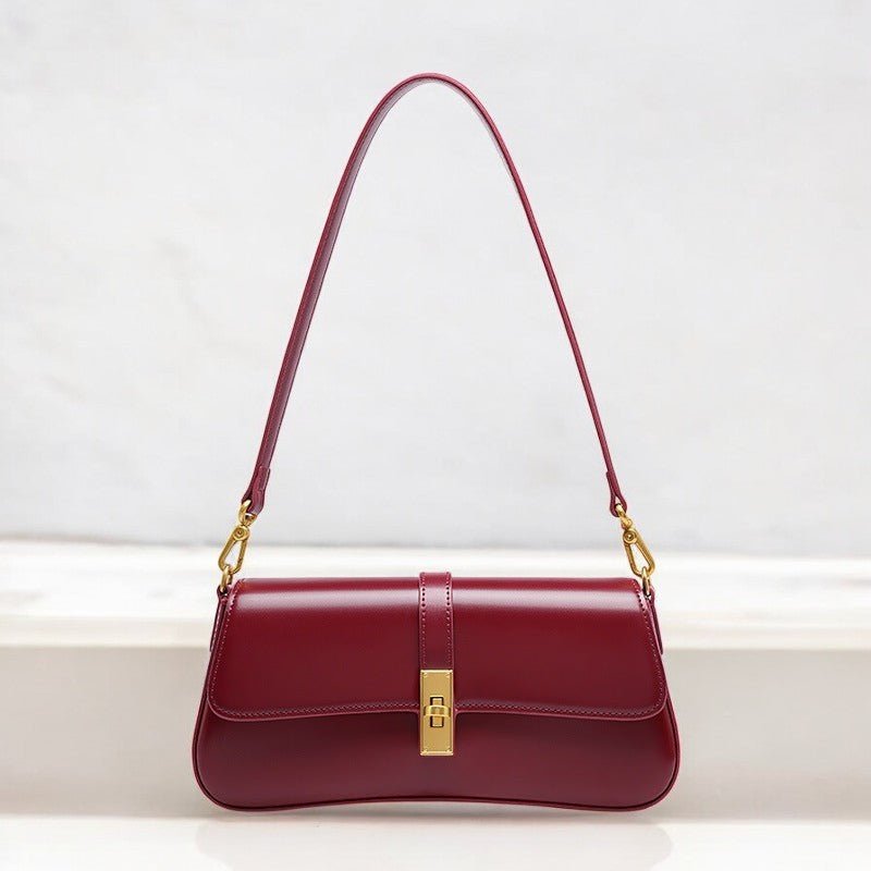 Éloise | Sleek Leather Baguette Bag – Detachable Strap & Gold - Tone Lock - in Burgundy | Arvea Bags