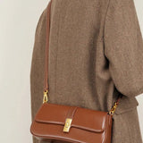 Éloise | Sleek Leather Baguette Bag – Detachable Strap & Gold - Tone Lock - in Burgundy | Arvea Bags