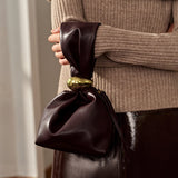 Eryndra | Burgundy Vegan Leather Knot Clutch – Modern & Elegant - in Wine Red | Arvea Bags