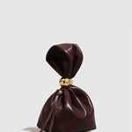Eryndra | Burgundy Vegan Leather Knot Clutch – Modern & Elegant - in Wine Red | Arvea Bags