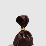 Eryndra | Burgundy Vegan Leather Knot Clutch – Modern & Elegant - in Wine Red | Arvea Bags