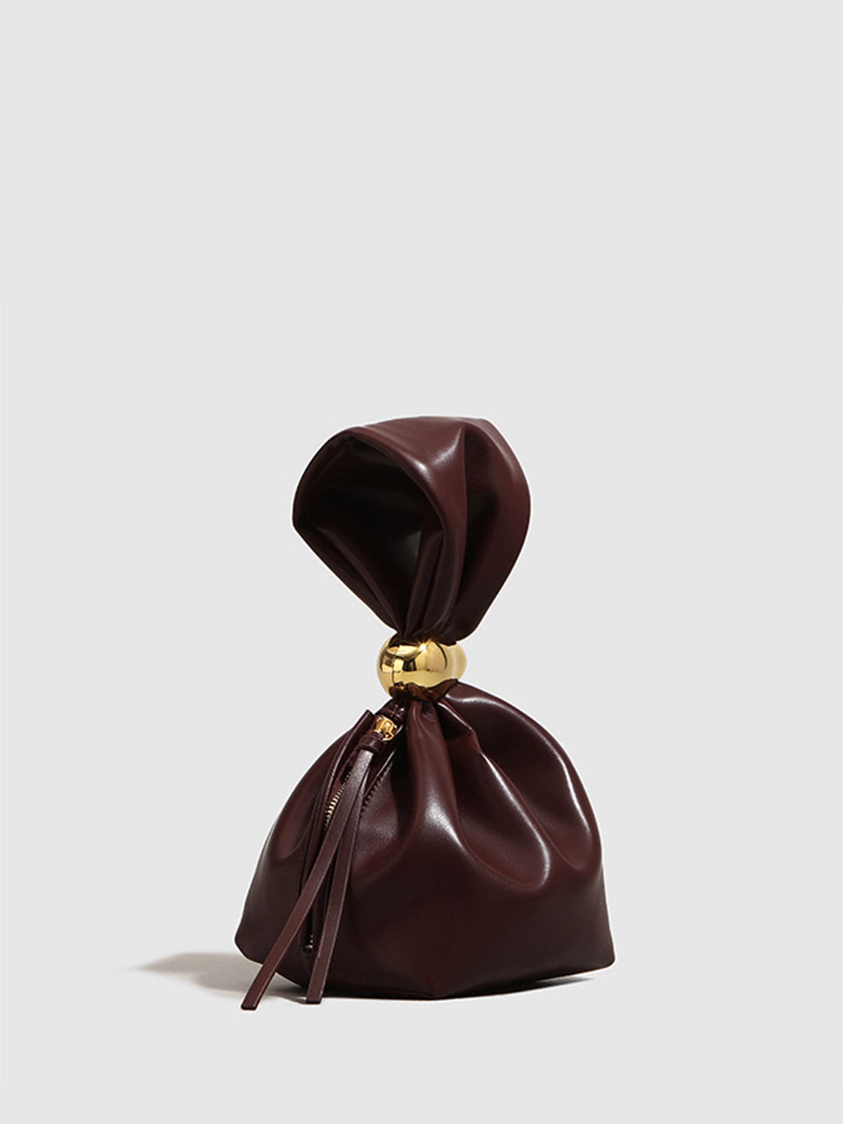 Eryndra | Burgundy Vegan Leather Knot Clutch – Modern & Elegant - in Wine Red | Arvea Bags