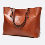 Glossy Brown Faux Leather Tote Bag - Sleek & Spacious - in Camel | Arvea Bags