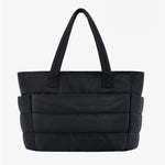 Large black padded puffer tote – stylish quilted handbag with top handles - in Black | Arvea Bags