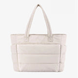 Large black padded puffer tote – stylish quilted handbag with top handles - in Cream | Arvea Bags