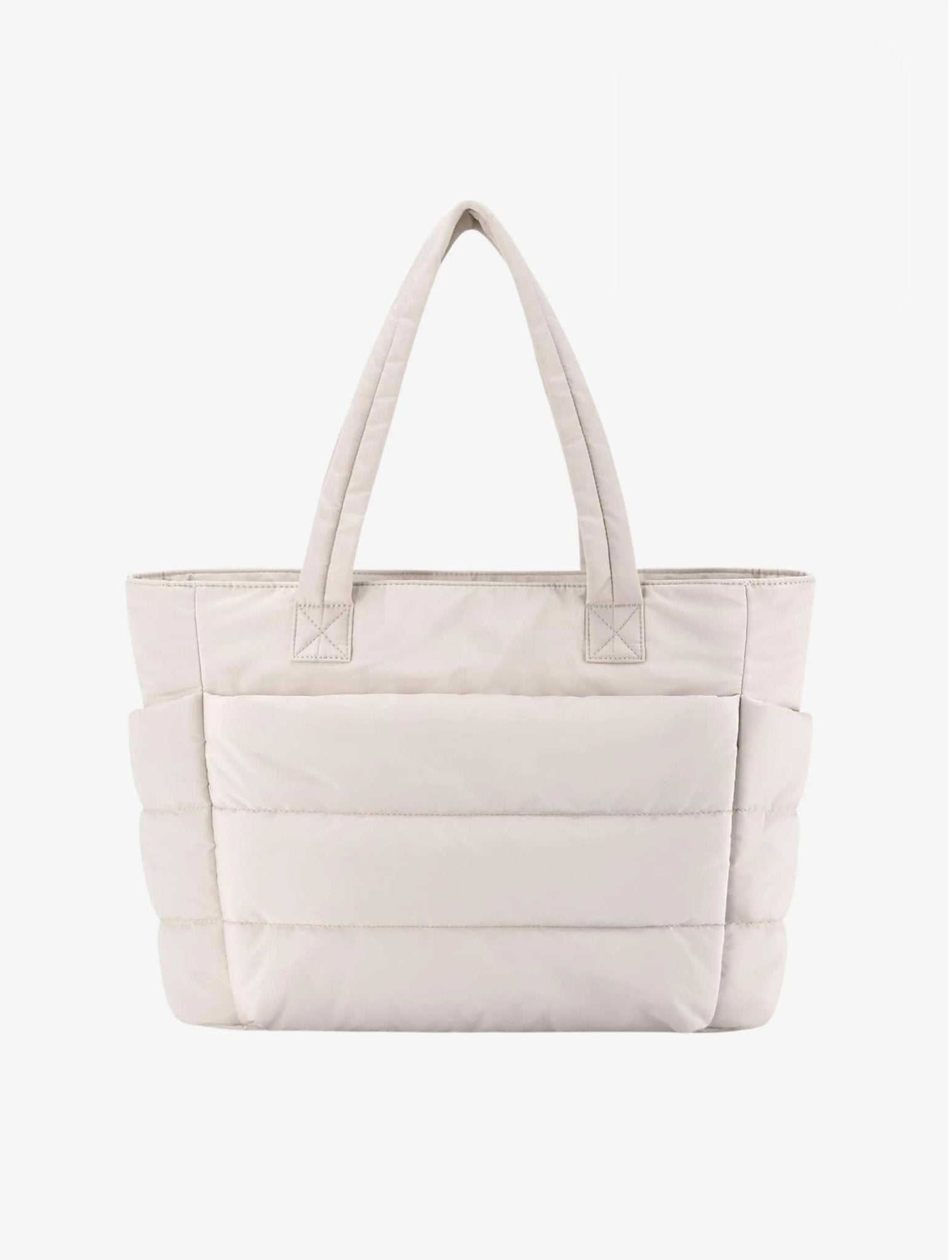 Large black padded puffer tote – stylish quilted handbag with top handles - in Cream | Arvea Bags