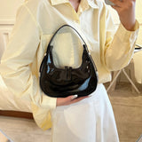 Lumi | Patent Leather Mini Hobo Bag – Glossy Finish & Curved Silhouette - in Black | Arvea Bags