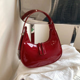 Lumi | Patent Leather Mini Hobo Bag – Glossy Finish & Curved Silhouette - in Red | Arvea Bags