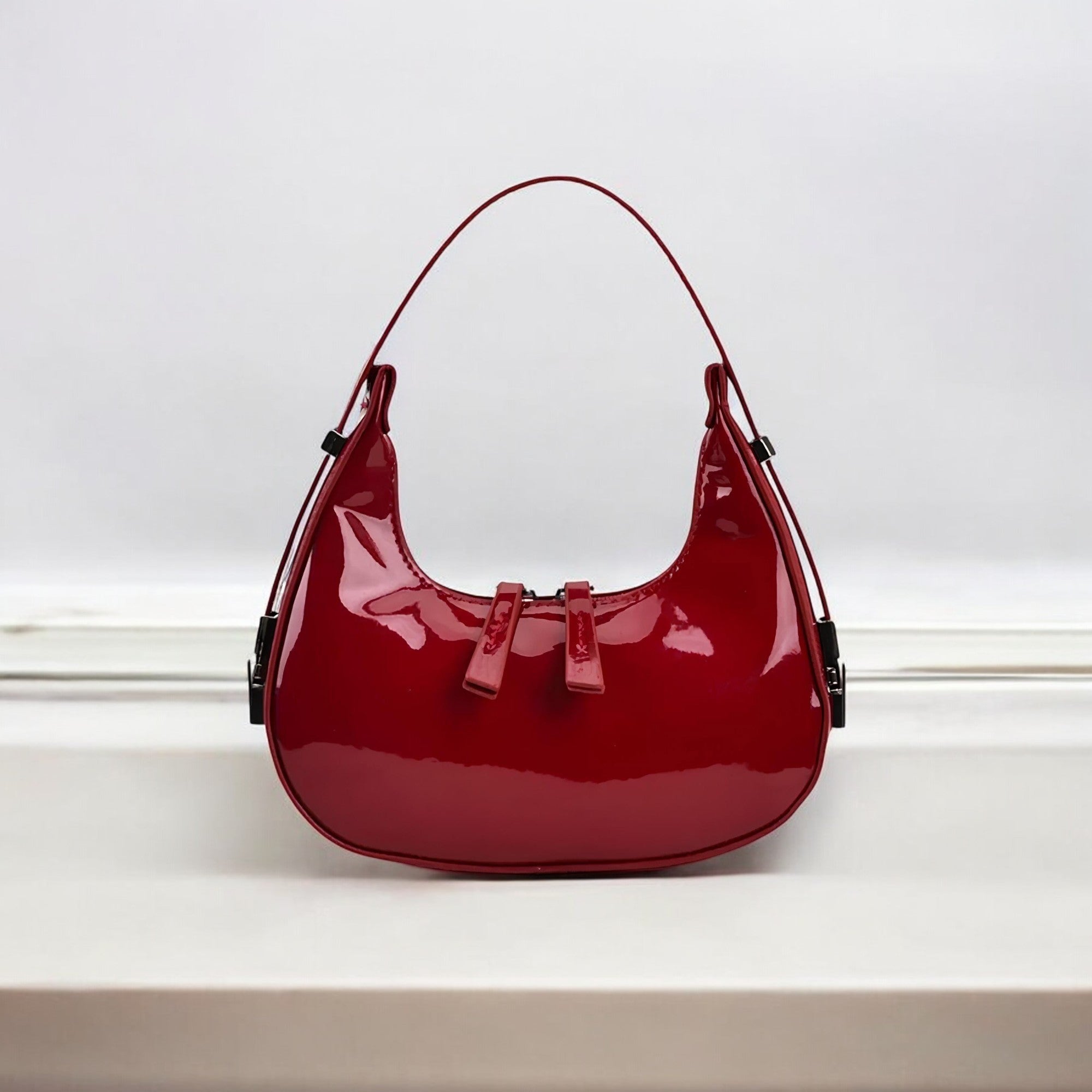 Lumi | Patent Leather Mini Hobo Bag – Glossy Finish & Curved Silhouette - in Red | Arvea Bags