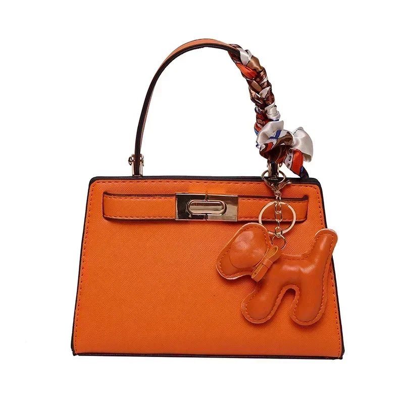 Luna | Black Mini Handbag with Scarf & Charm – Elegant & Playful - in Orange | Arvea Bags