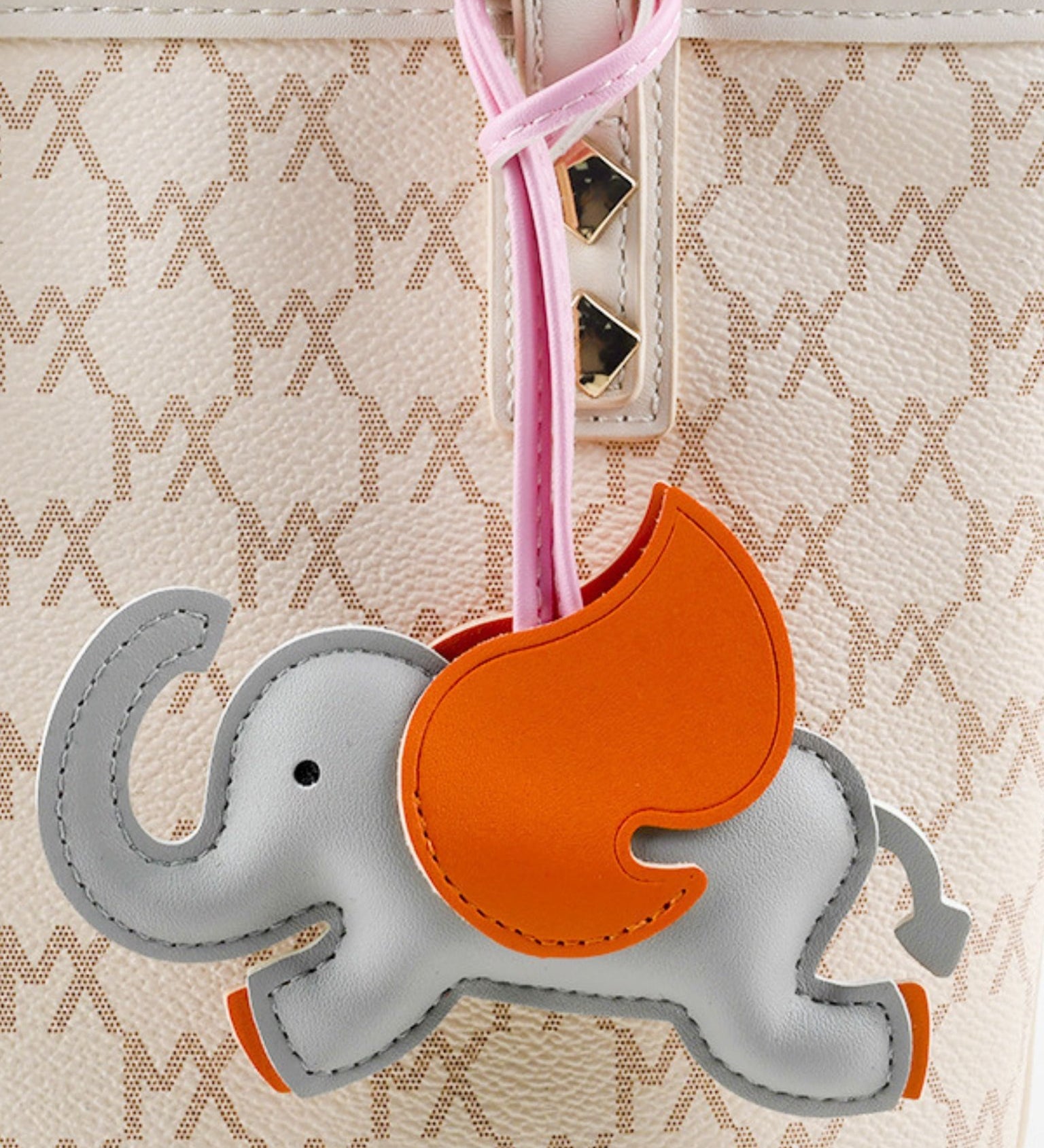 Luthien | Flying Elephant Leather Bag Charm – Whimsical Elegance & Playful Luxury - in Gray | Arvea Bags
