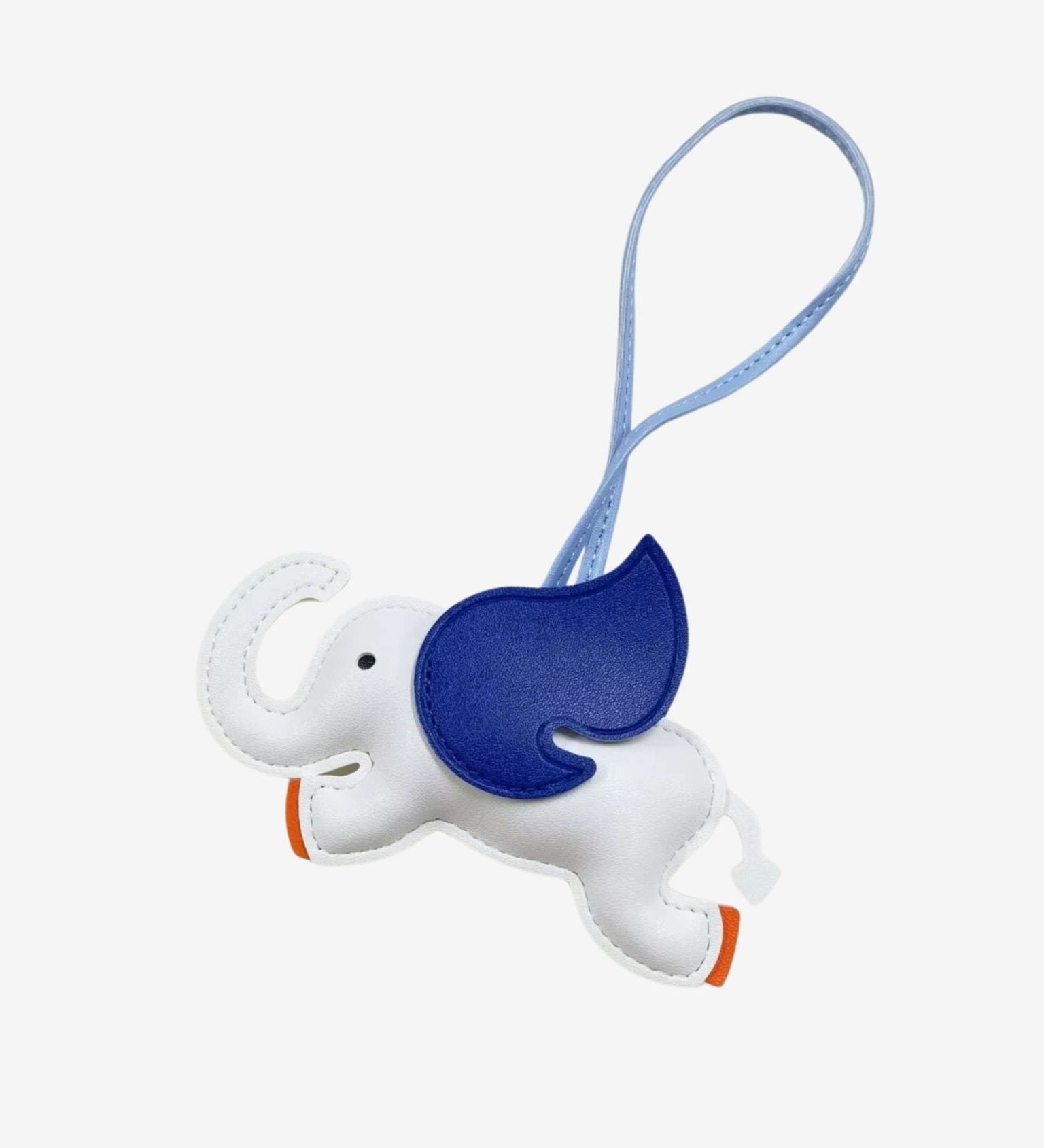 Luthien | Flying Elephant Leather Bag Charm – Whimsical Elegance & Playful Luxury - in Light Beige | Arvea Bags