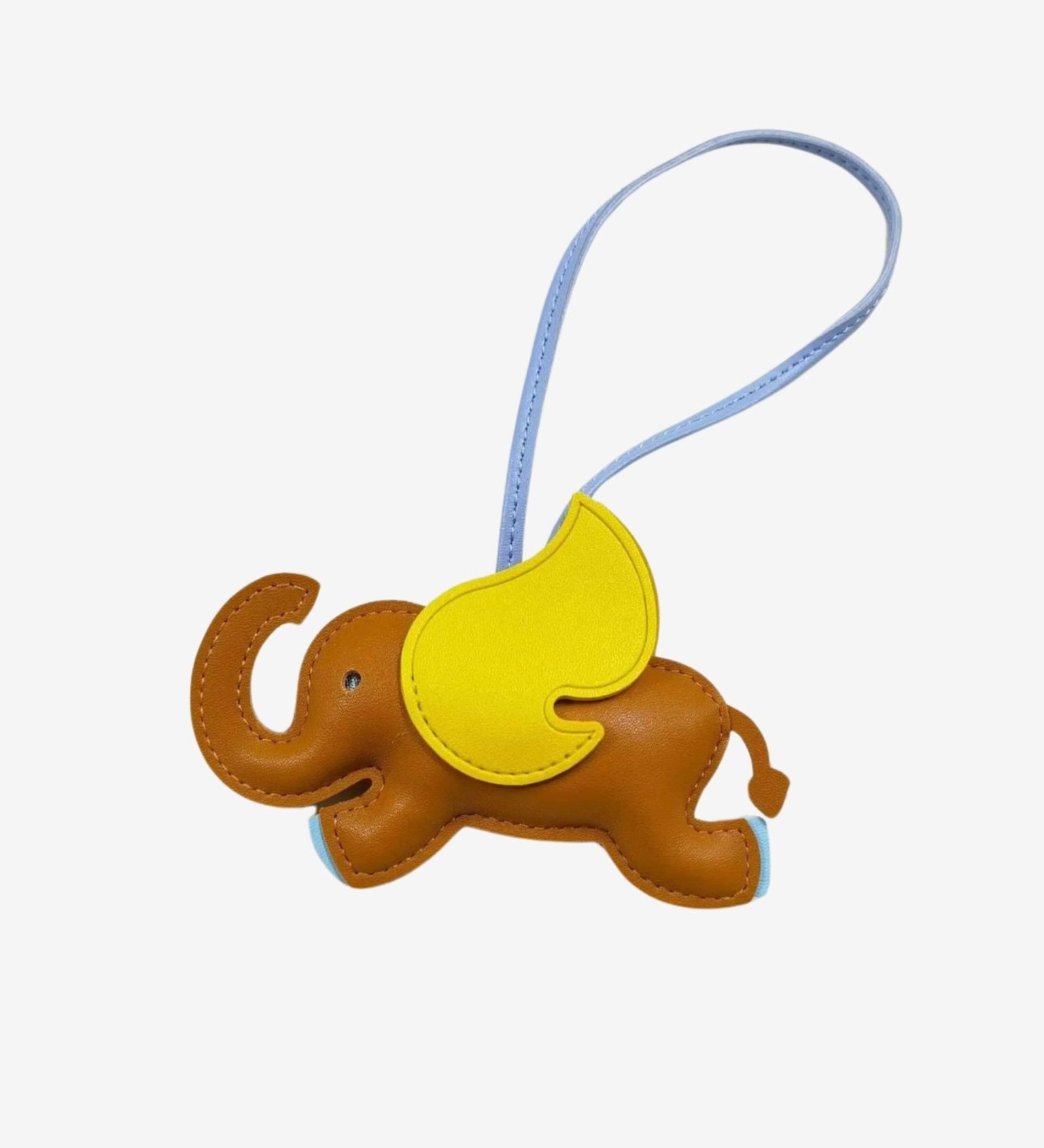 Luthien | Flying Elephant Leather Bag Charm – Whimsical Elegance & Playful Luxury - in Light Brown | Arvea Bags