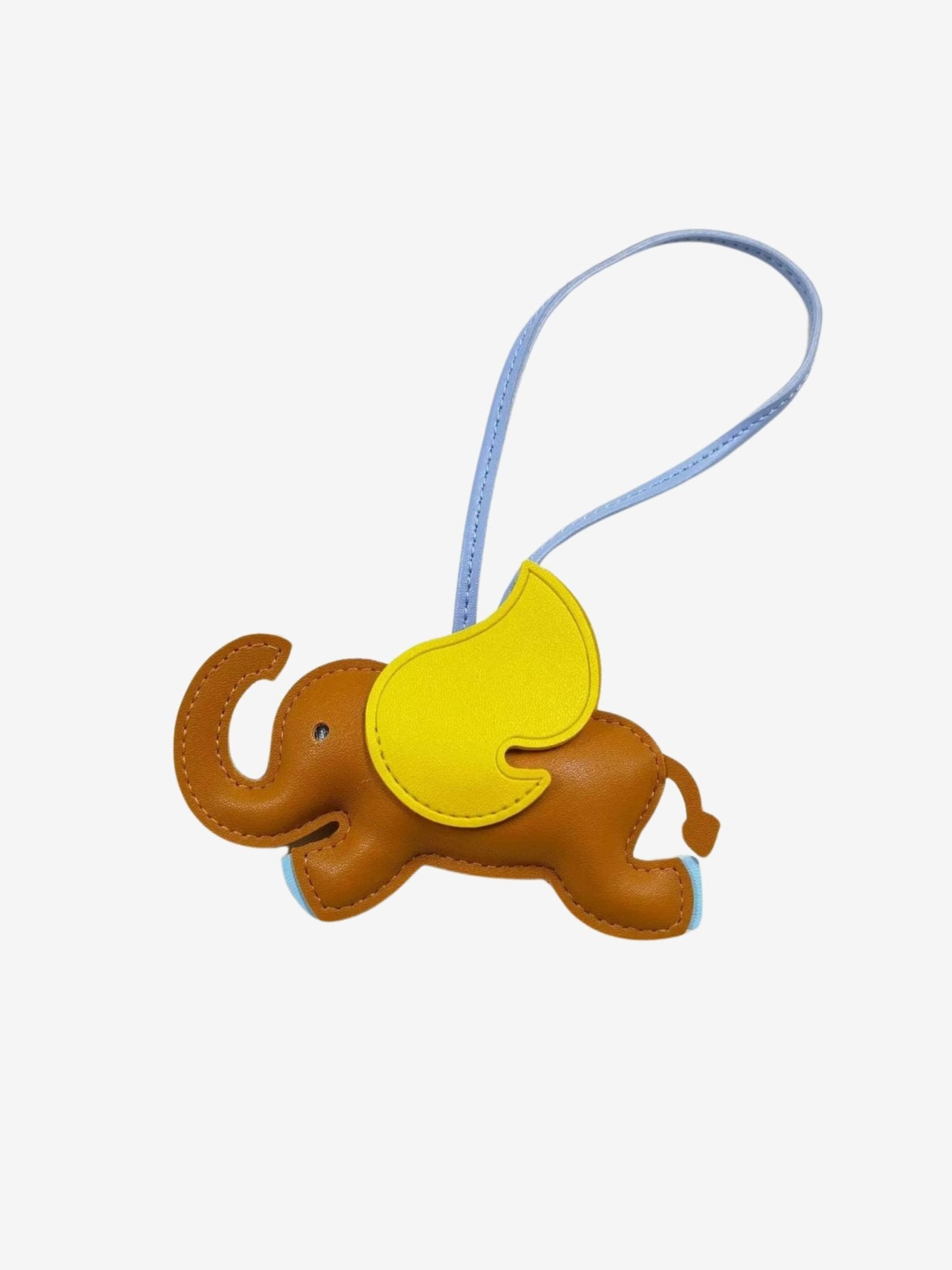 Luthien | Flying Elephant Leather Bag Charm – Whimsical Elegance & Playful Luxury - in Light Brown | Arvea Bags