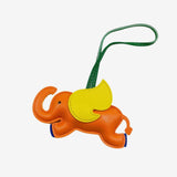 Luthien | Flying Elephant Leather Bag Charm – Whimsical Elegance & Playful Luxury - in Orange | Arvea Bags