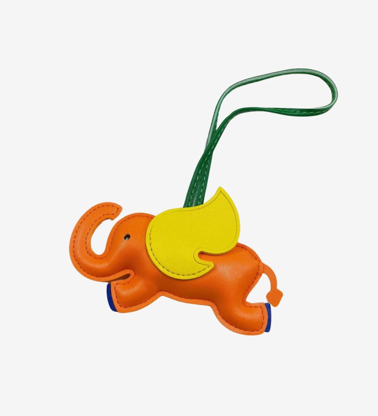 Luthien | Flying Elephant Leather Bag Charm – Whimsical Elegance & Playful Luxury - in Orange | Arvea Bags
