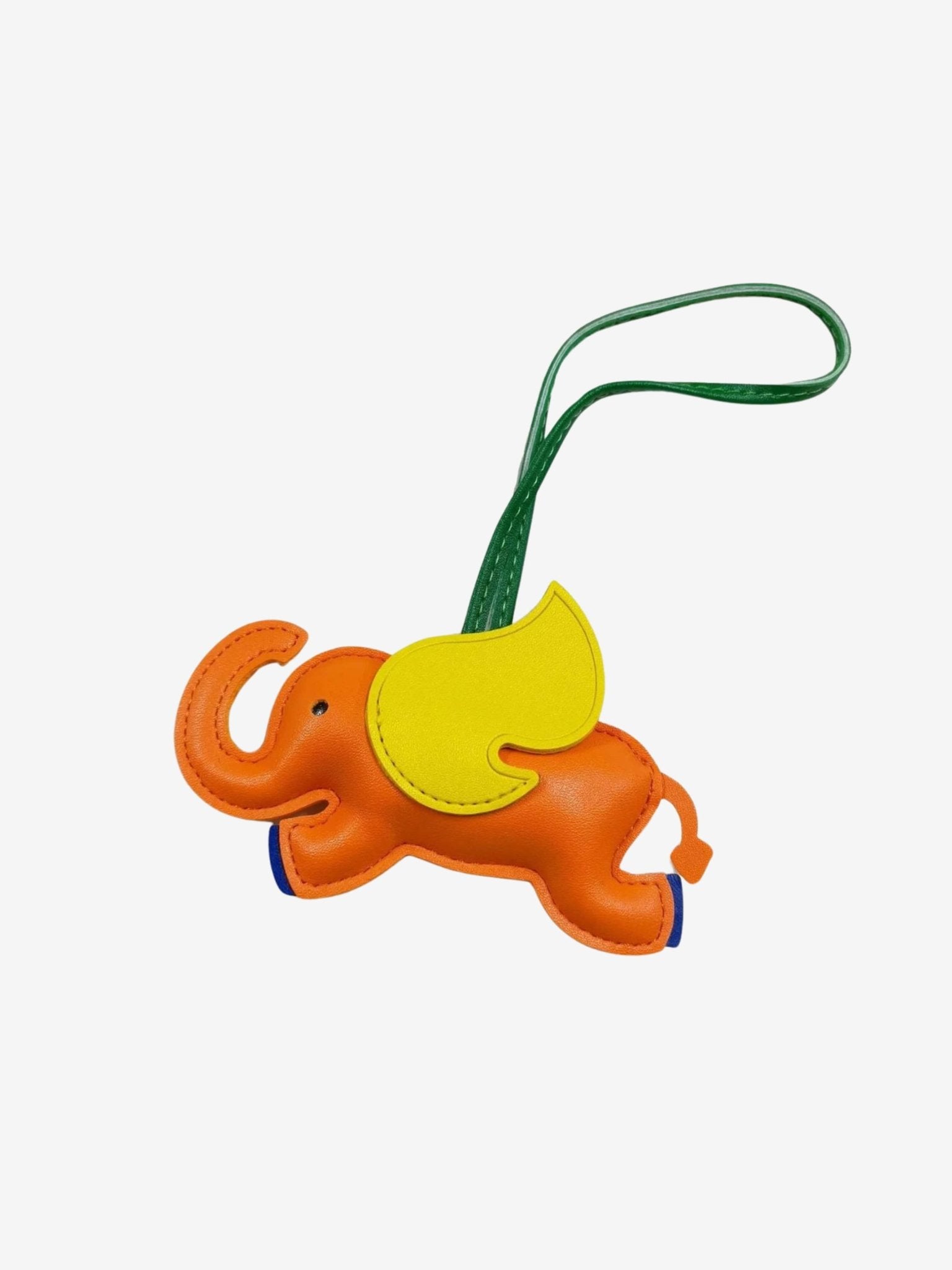 Luthien | Flying Elephant Leather Bag Charm – Whimsical Elegance & Playful Luxury - in Orange | Arvea Bags