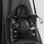 Maelora | Glossy Black Leather Drawstring Bag – Chic & Modern - in Black | Arvea Bags