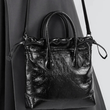 Maelora | Glossy Black Leather Drawstring Bag – Chic & Modern - in Black | Arvea Bags