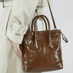Maelora | Glossy Black Leather Drawstring Bag – Chic & Modern - in Cream | Arvea Bags